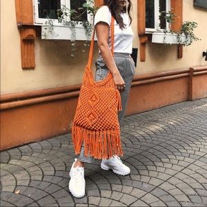 Orange handbag Carpisa Large crochet shoulder bag.